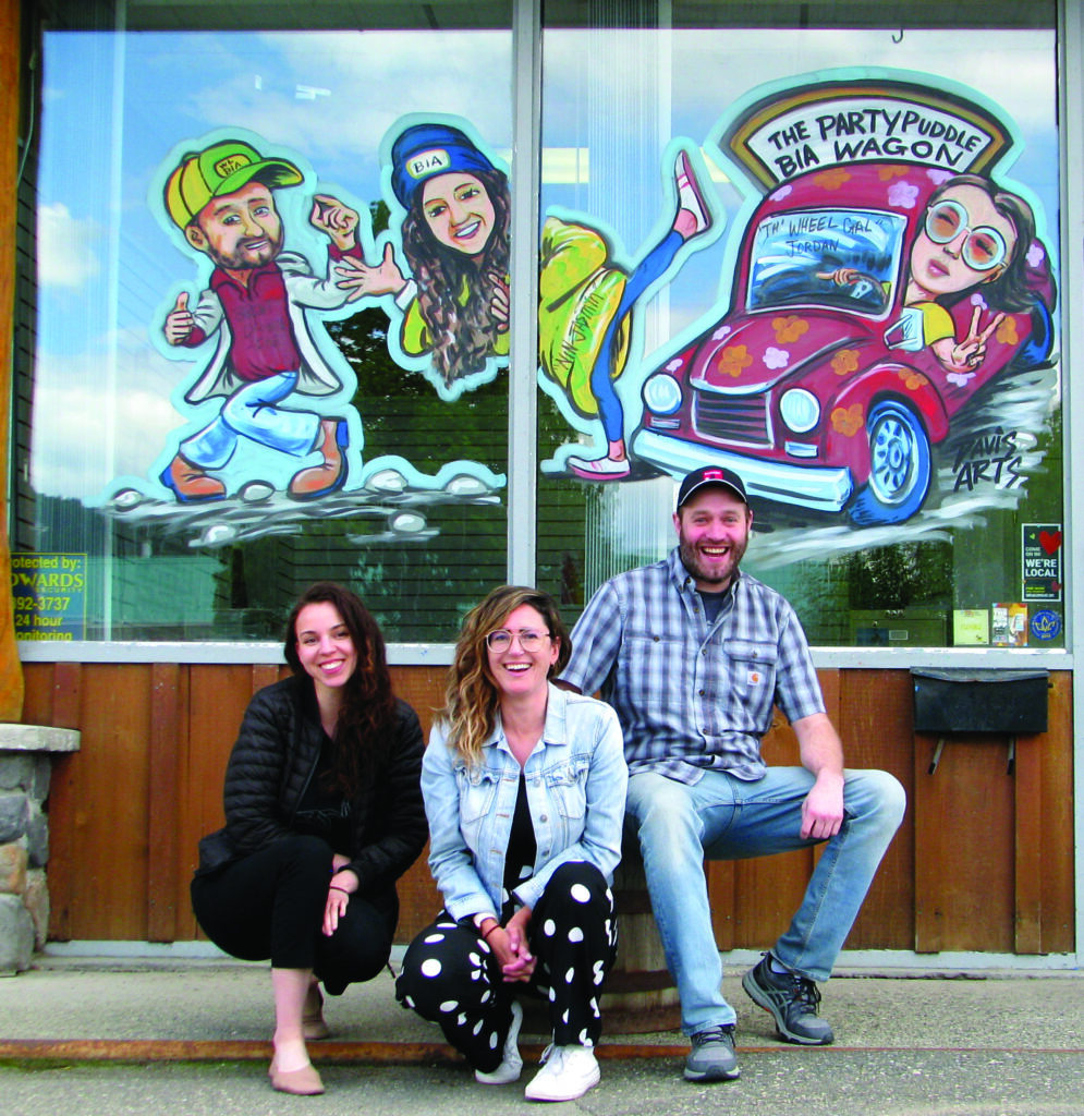 Staff at Downtown Williams Lake Business Improvement Association. (L. to R) Jasmine Alexander, events coordinator; Jordan Davis, executive director; and Brent Dafoe, business coordinator pose with their window character doubles by Dwayne Davis of @Davis Arts Business Portrait Project. Photo: Lisa Bland